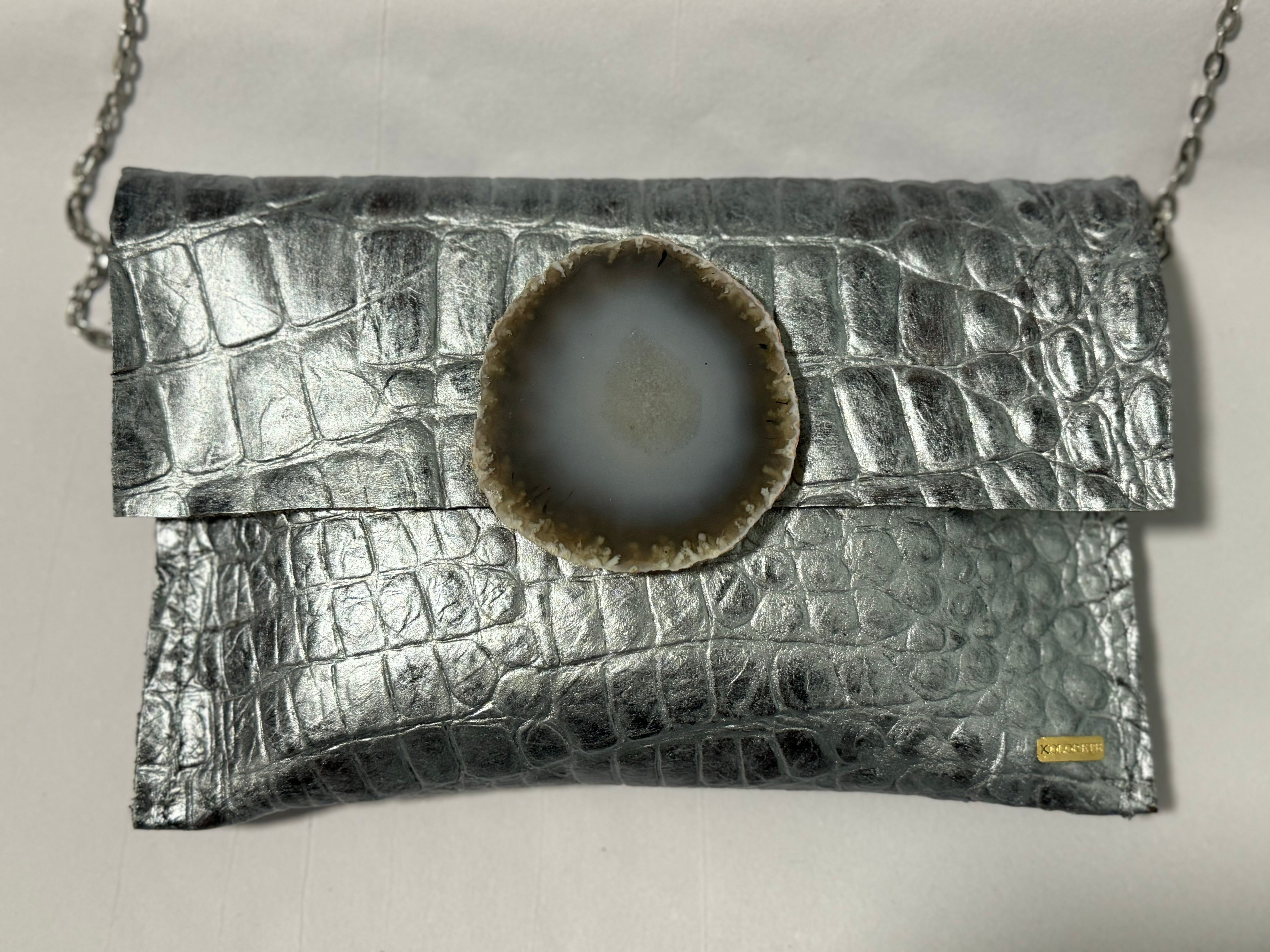 Silver Neutral KOLORETE Leather clutch bag with chain